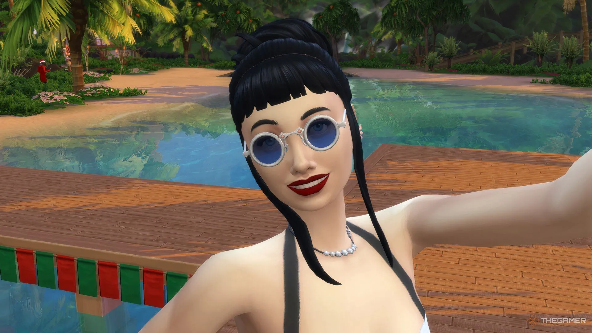 Một Sim đang tự chụp ảnh trên cầu tàu ở Sulani trong The Sims 4.