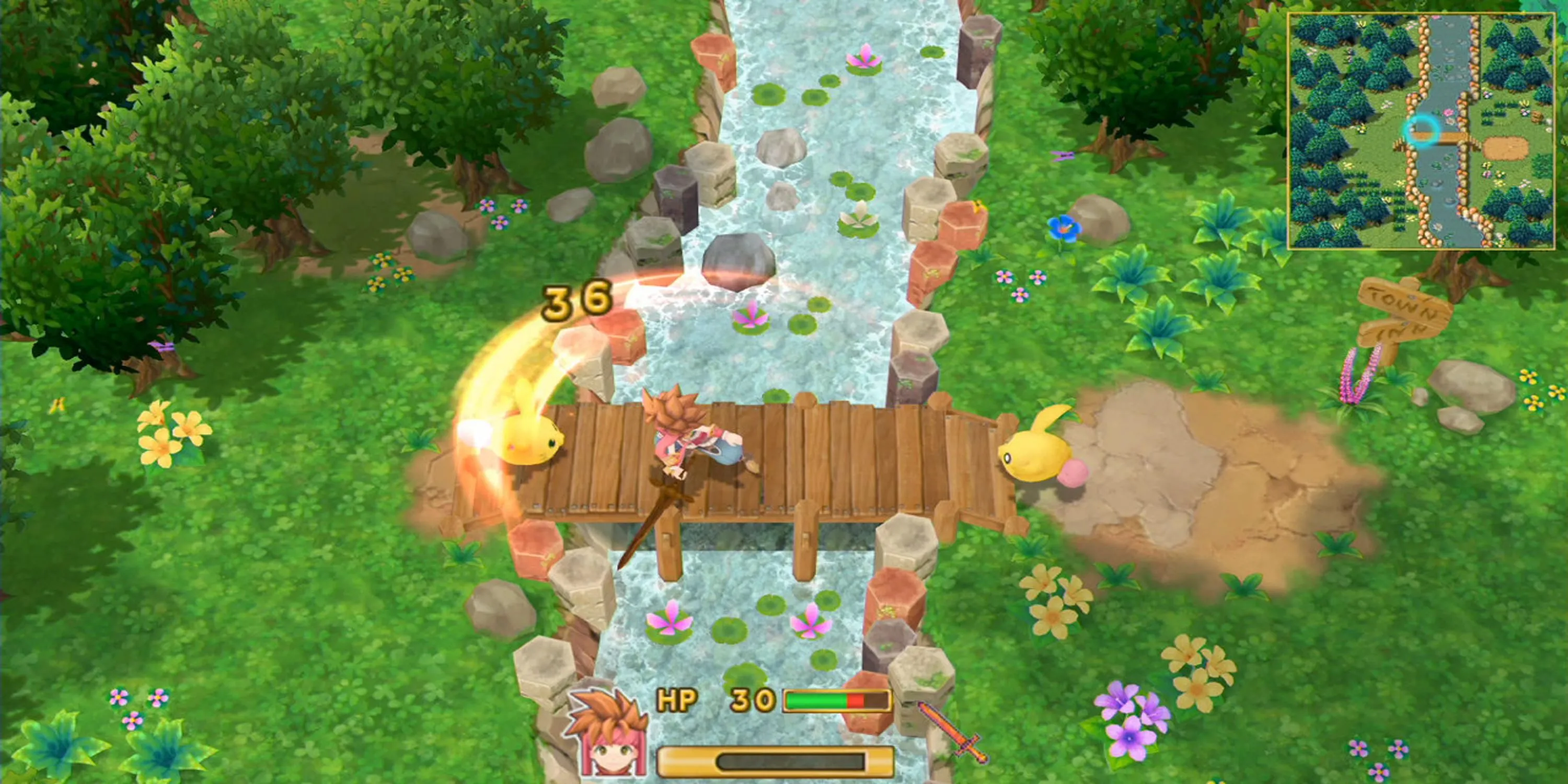 Nhân vật chính vung kiếm tấn công quái vật trong game Secret of Mana 2018