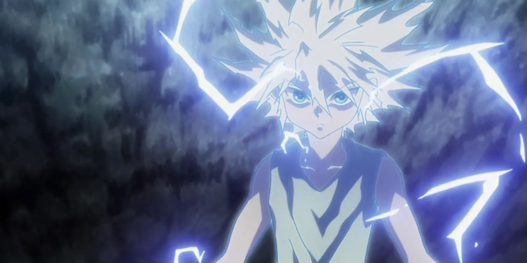 Killua Zoldyck trong trang phục quen thuộc, phản ánh sự trưởng thành từ cậu bé sát thủ.