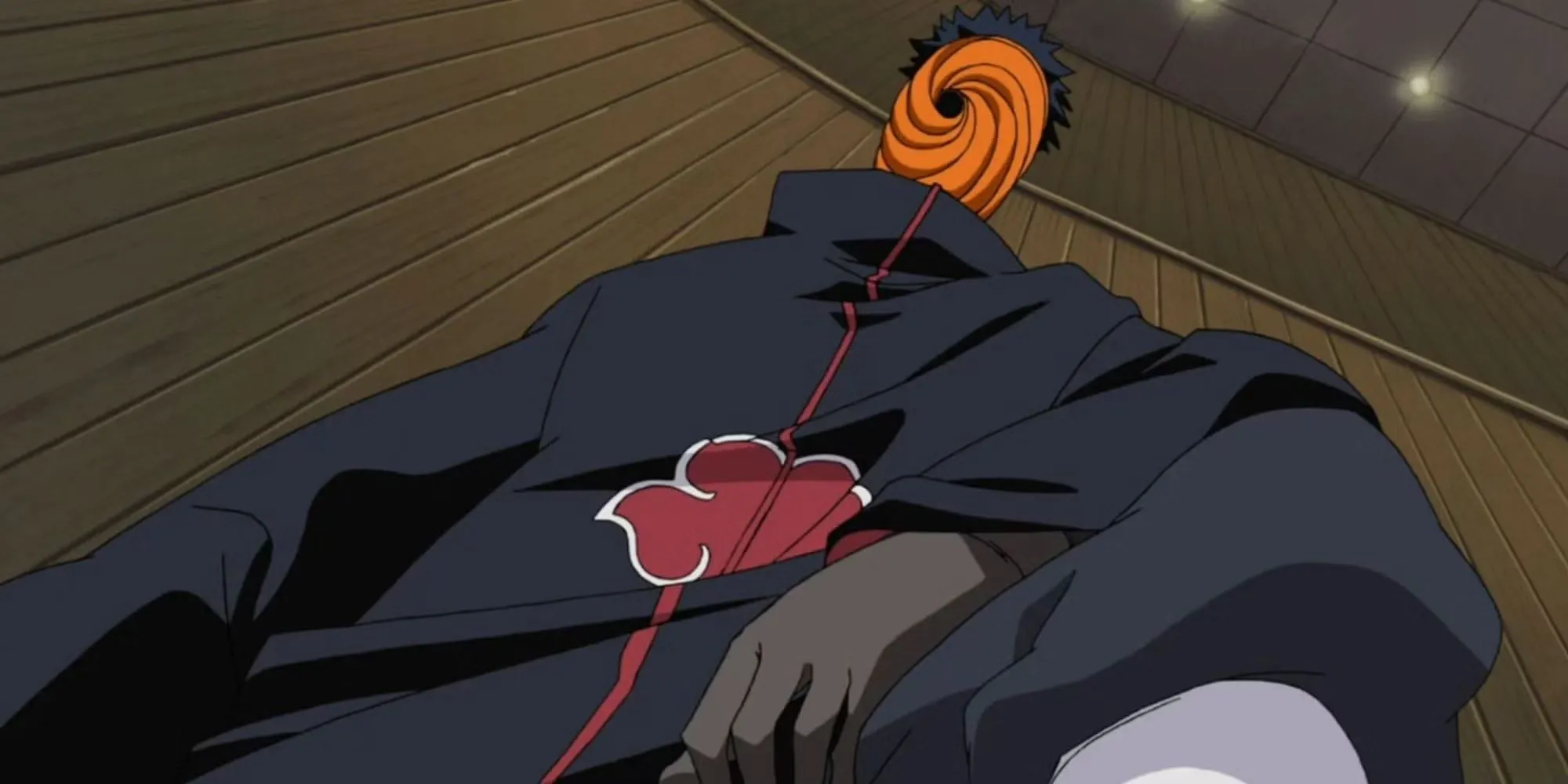 Obito Uchiha thực hiện Kế hoạch Nguyệt Nhãn, một ảo thuật toàn cầu.